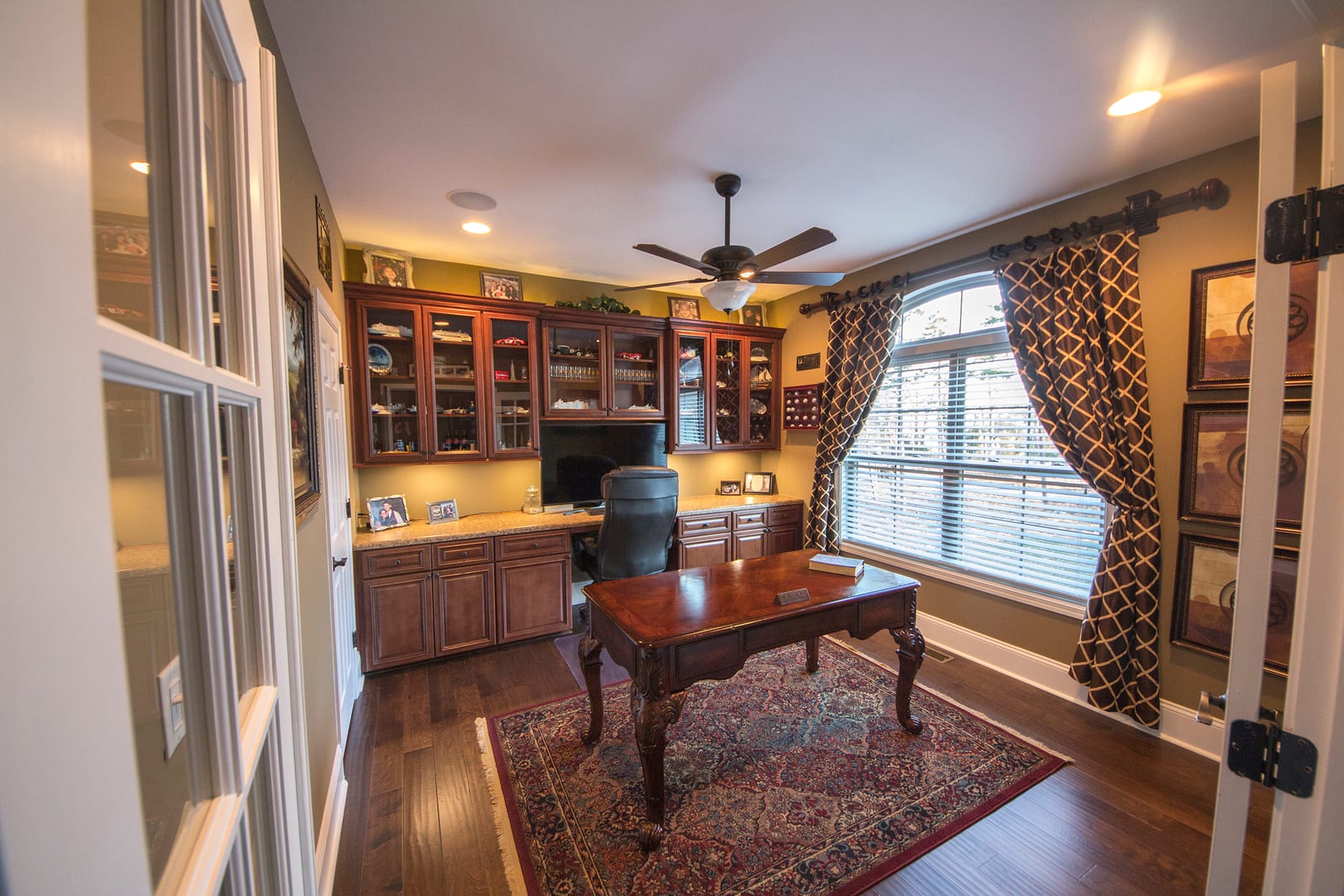 Home office design with built-in cabinetry