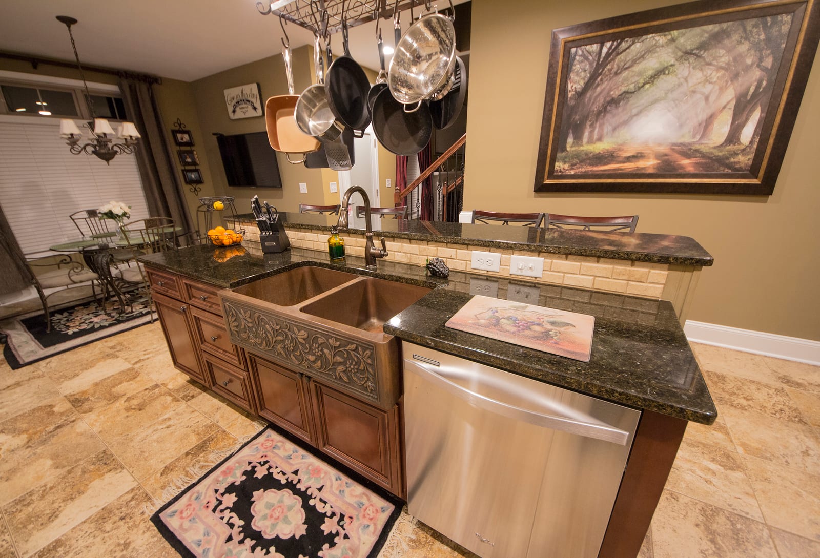 Kitchen design with granite counters and decorative farmhouse sink